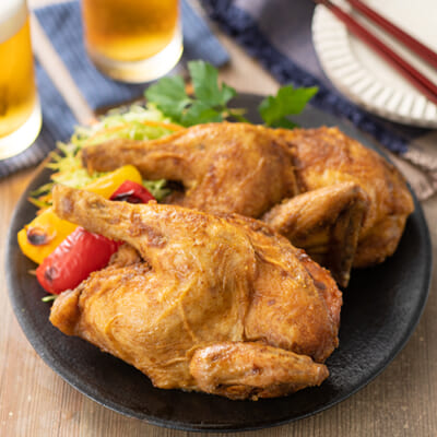 「越の鶏」の半身揚げ – 株式会社鳥よし食材
